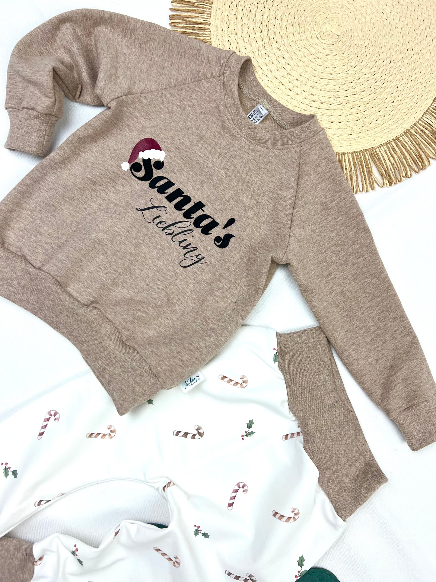 Weihnachtssweater „Santa‘s Liebling“